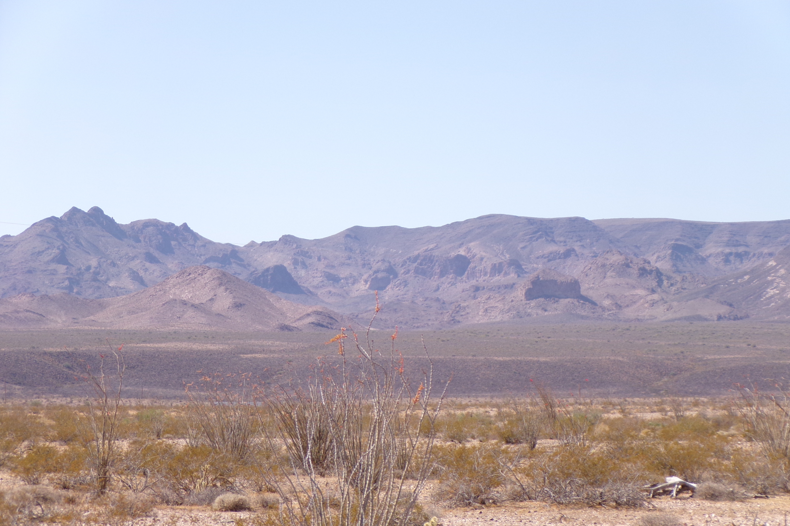 Convenient Tri-State Location! 1 Acre with Electricity Access! Yucca, AZ.